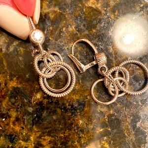 Beautiful dangle Judith Ripka earrings SS and CZ